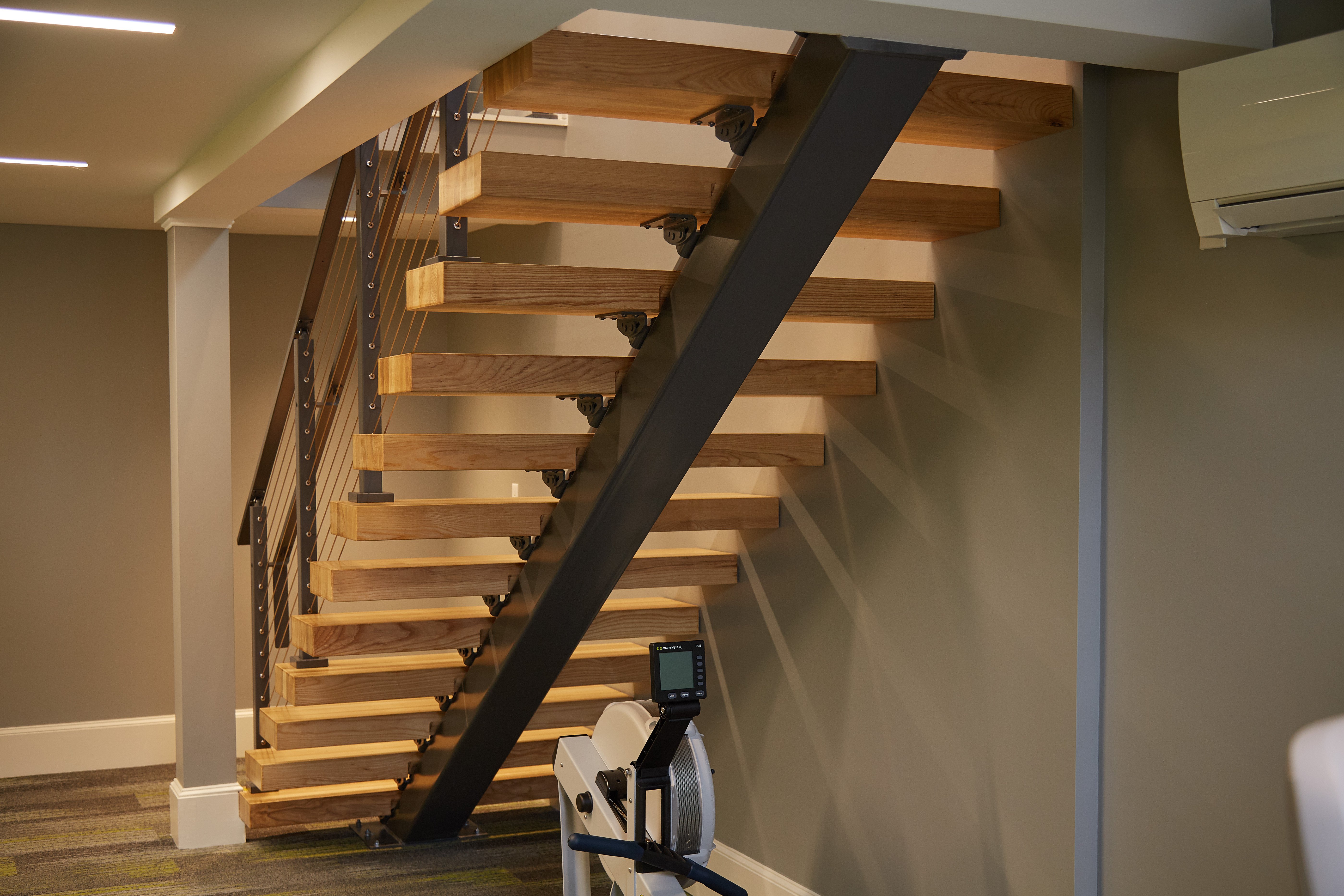 Floating Staircase Install in Modern Gym | Viewrail