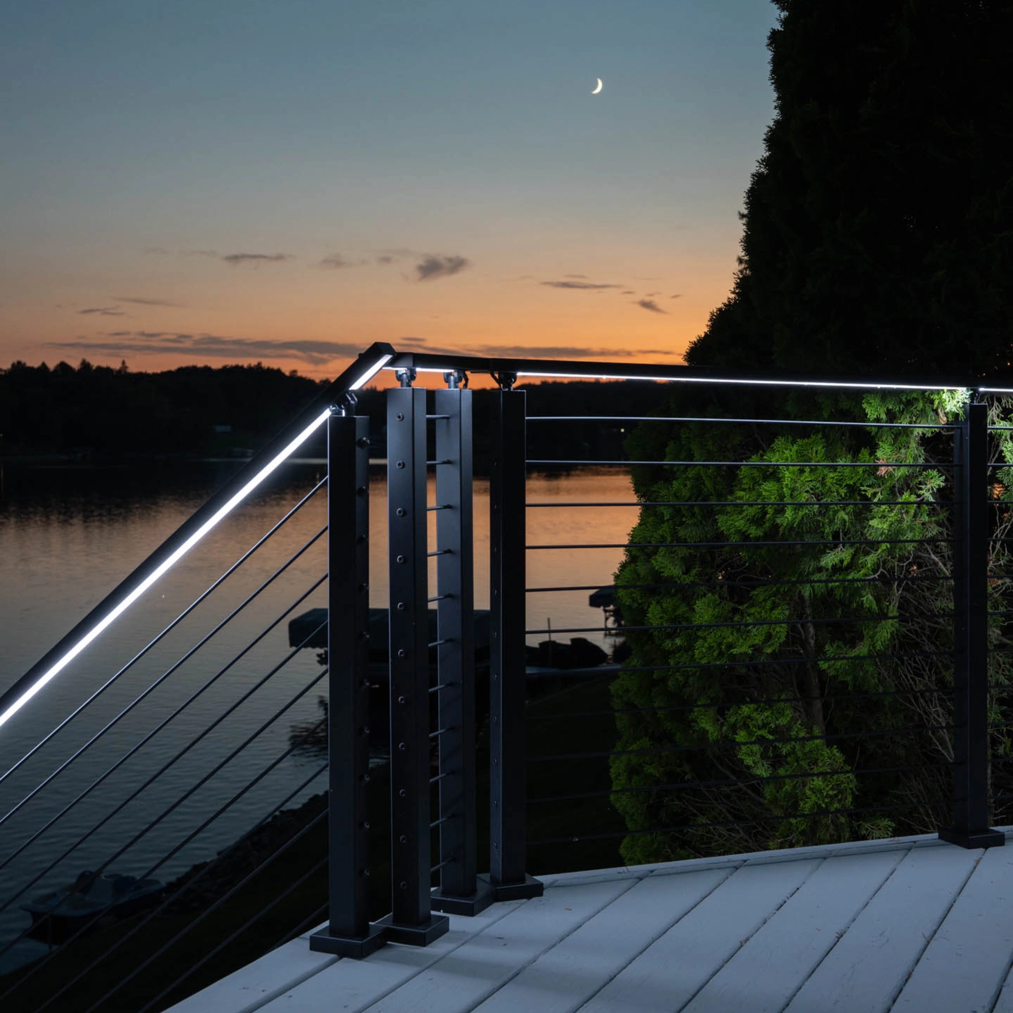 Signature Cable Railing with integrated LED handrail.