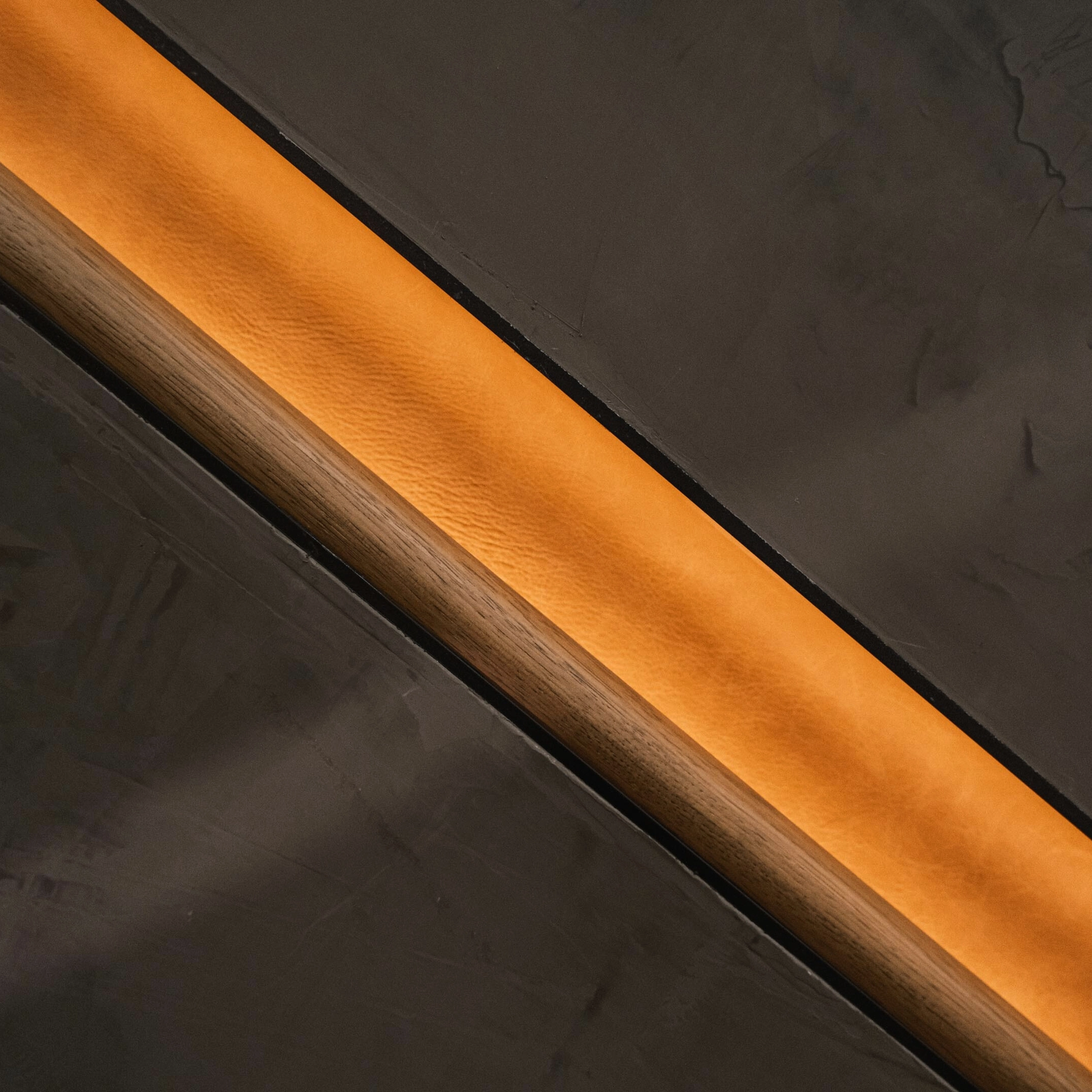 Close up of recessed handrail with lit up leather interior.