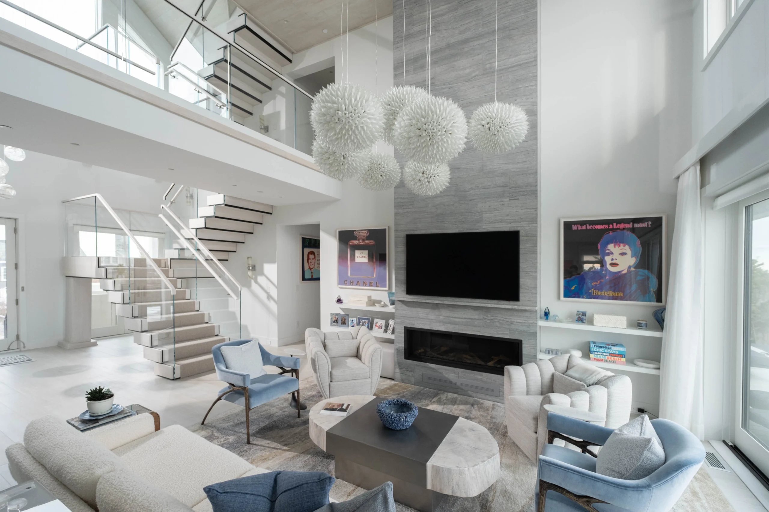 A two-story FLIGHT Stack is seen just off the main living room.