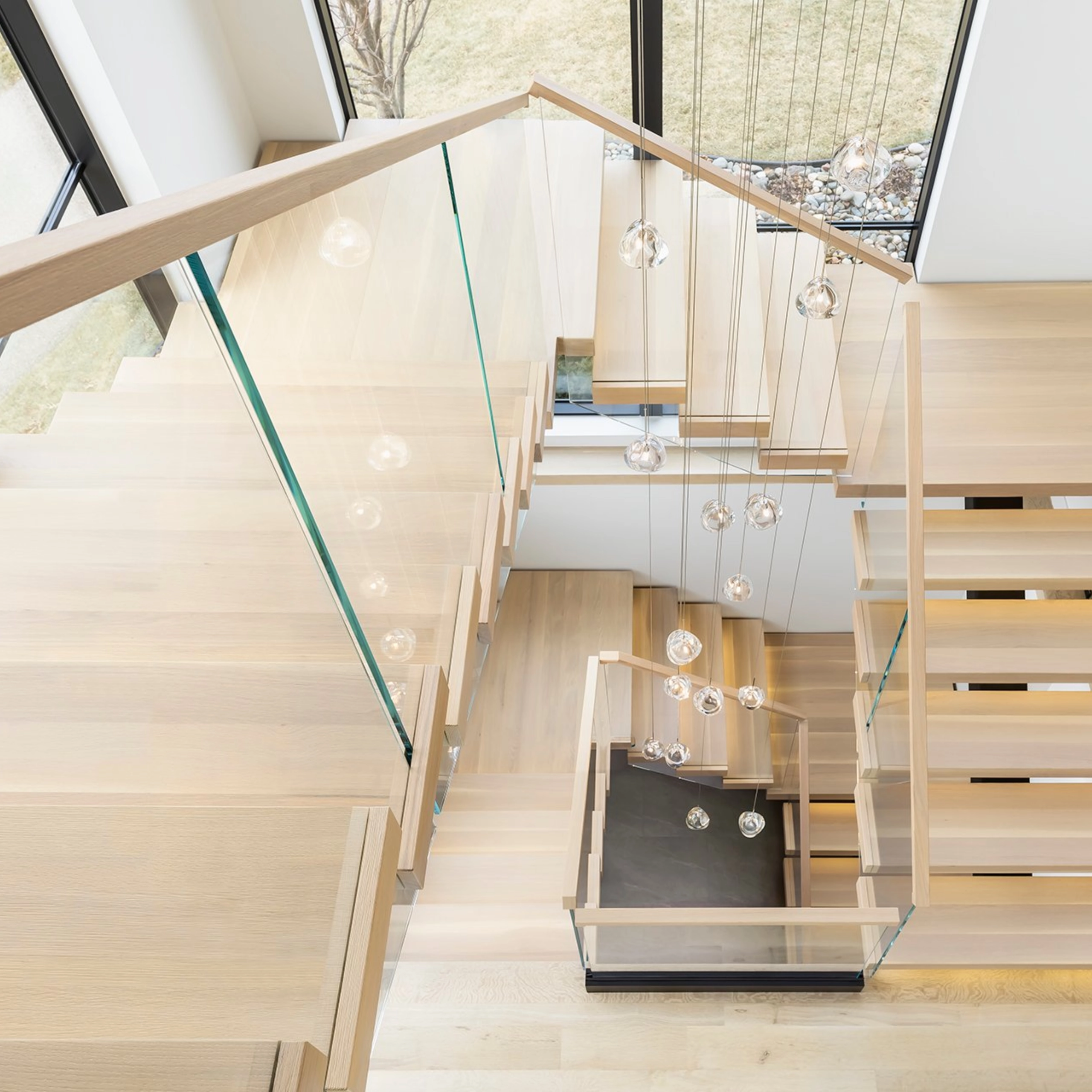 Overhead shot of a two-story FLIGHT Mono system with Vedera glass.