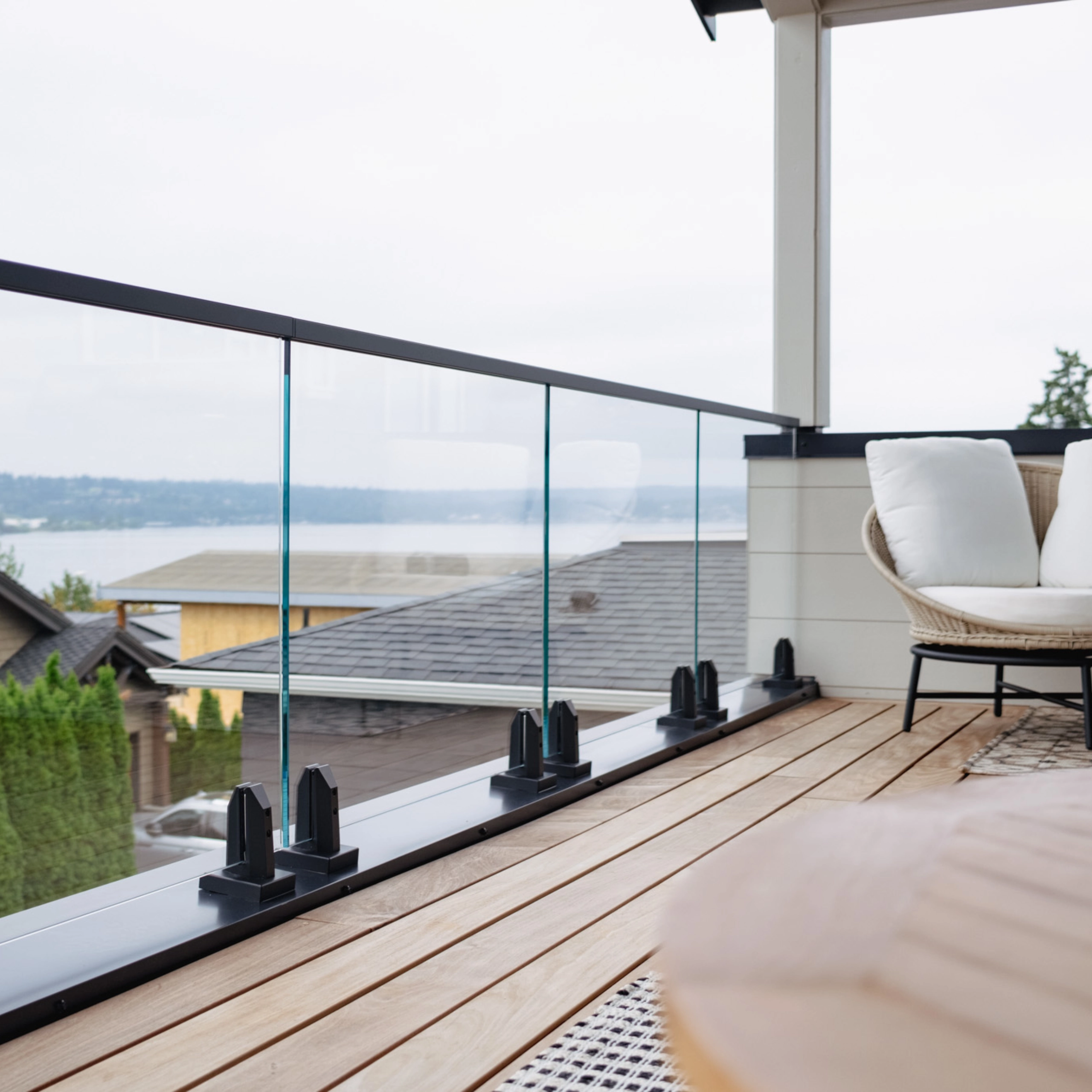 An Ascend Talons glass railing overlooks Lake Washington.