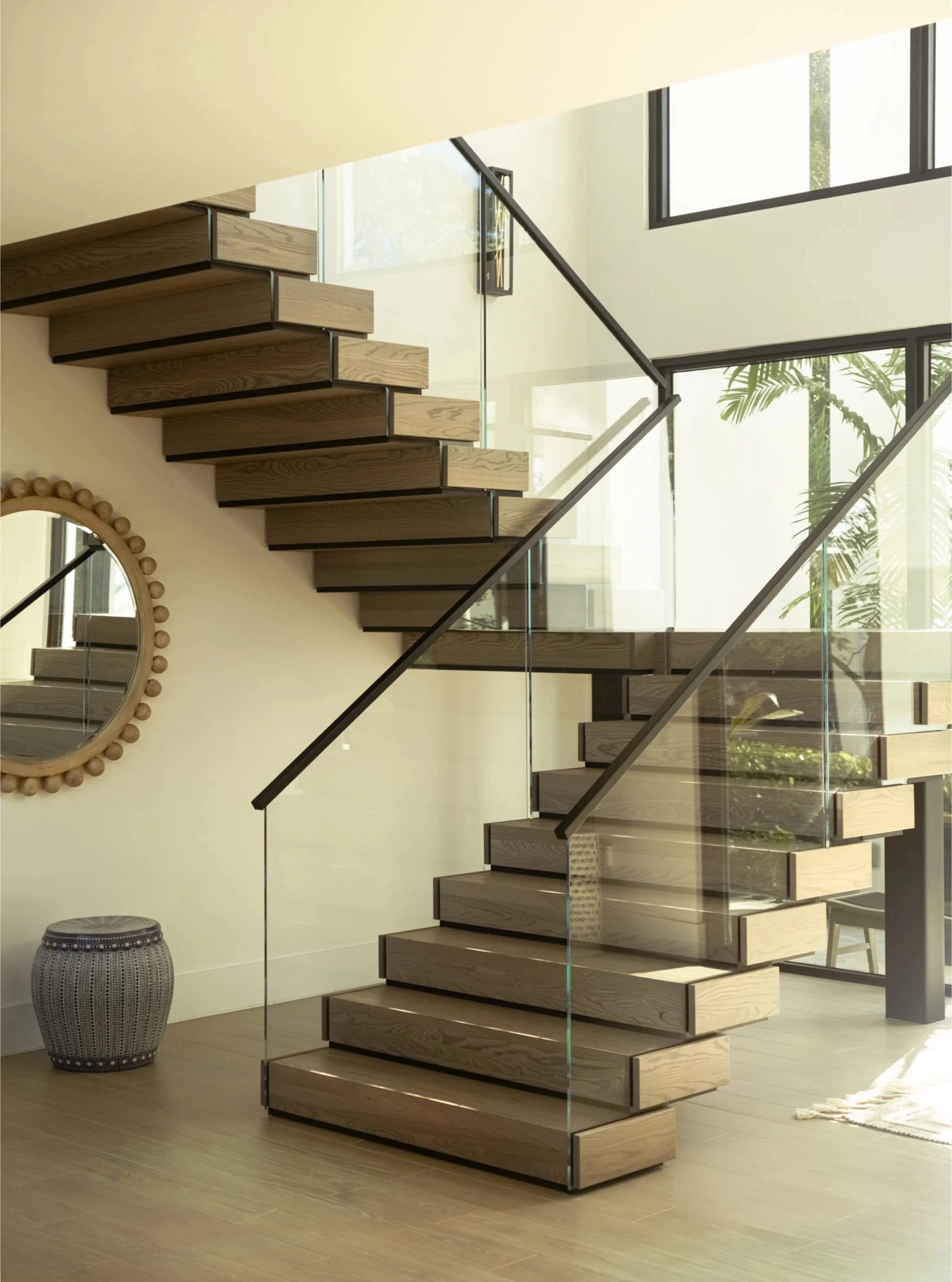 A FLIGHT Stack stair system with Vedera glass railing.